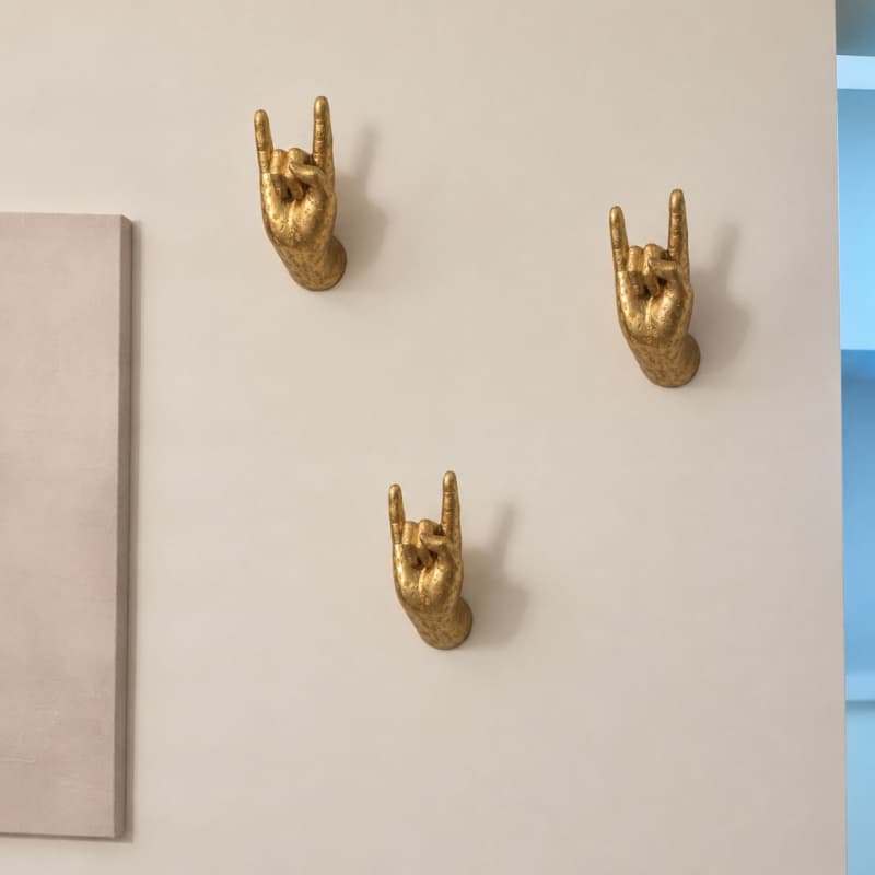 Kundenfoto mit mehreren goldenen Wandhänden