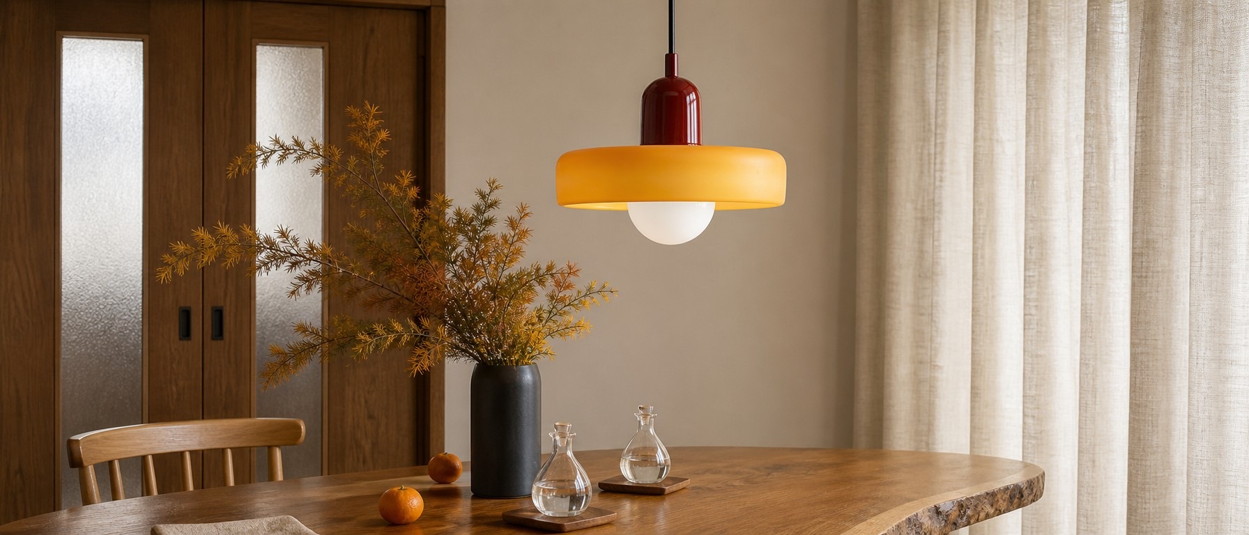 Morandi Disc Orb Glass Pendant Lamp in a dining room