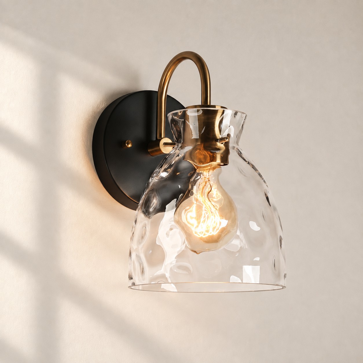 Brass Textured Clear | Glass Armed Wall Sconce — A layered perspective