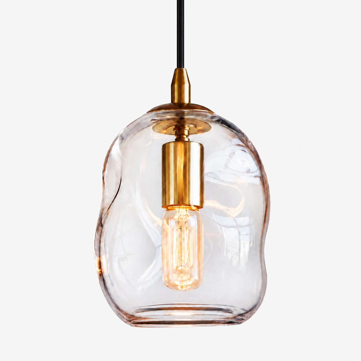 Brass-Finish Canopy | Hand-Blown Glass Globe Pendant — A layered perspective