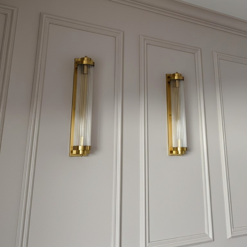 Kundenfoto zweier goldener Wandleuchten
