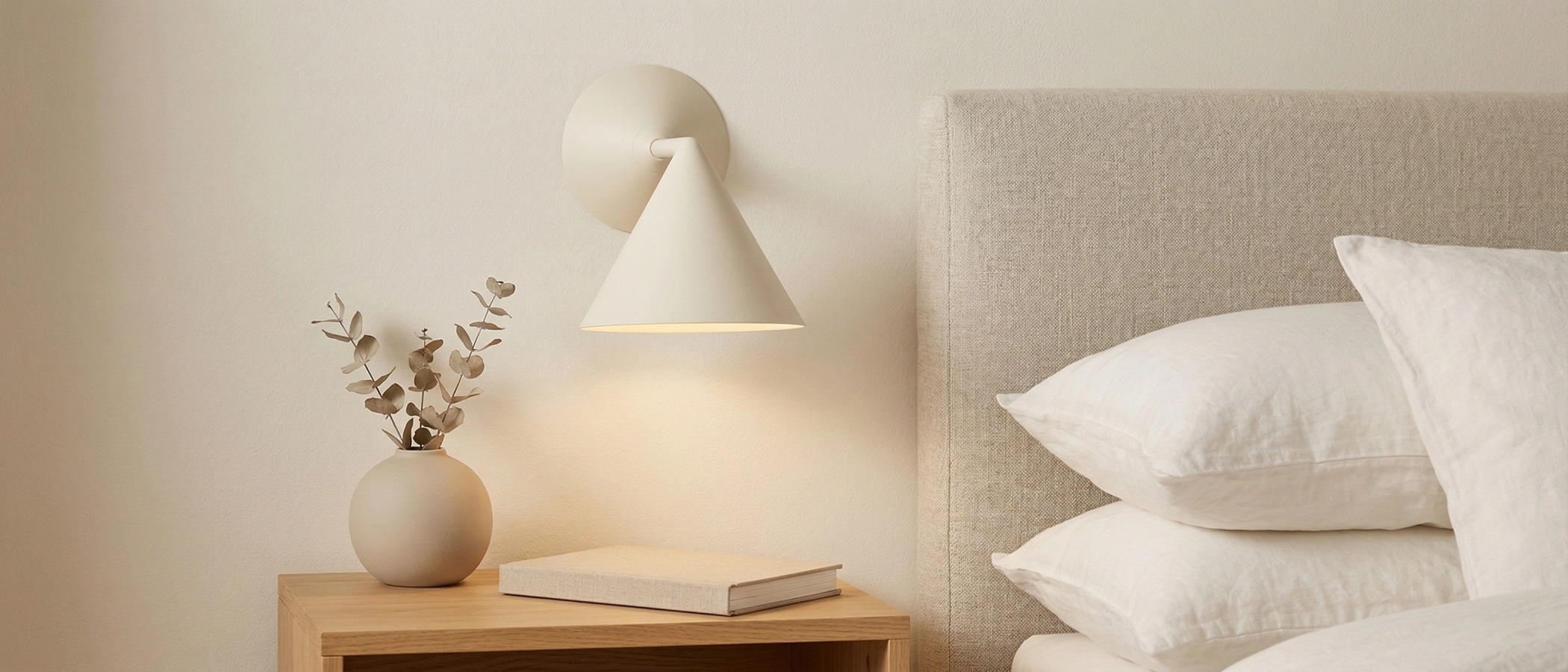 Brivana wall sconce in a hallway setting