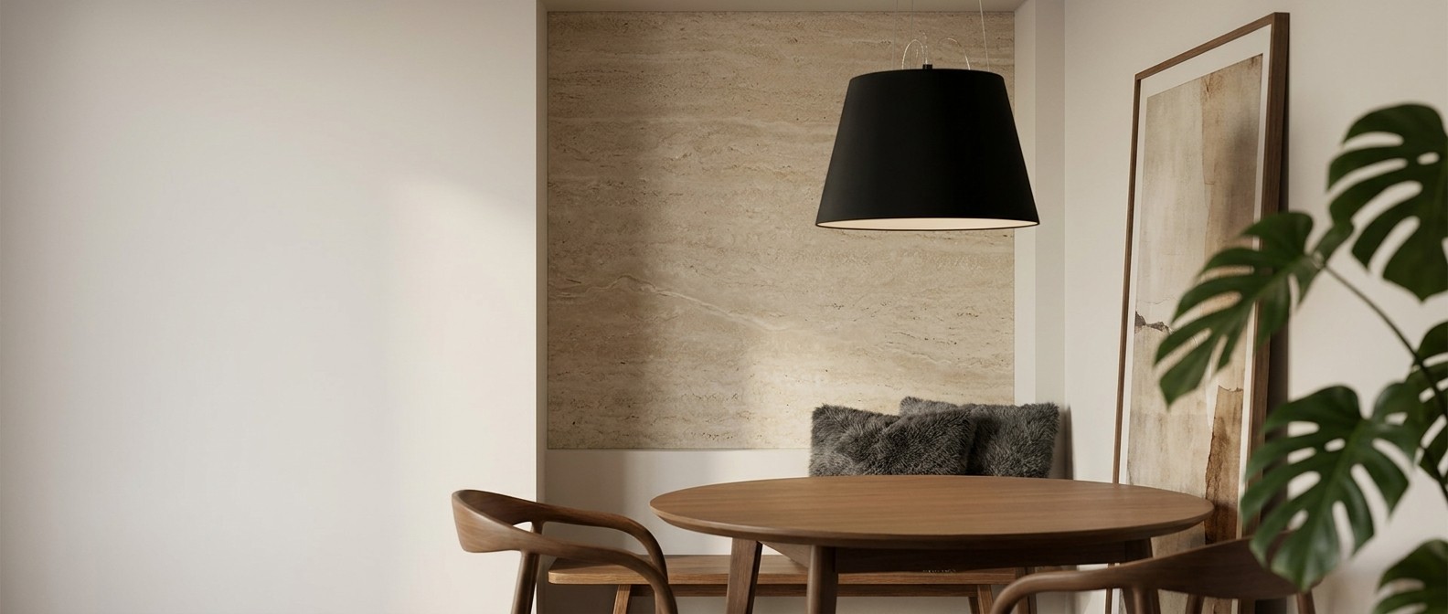 Tolomeo Mega hanging lamp above a dining table
