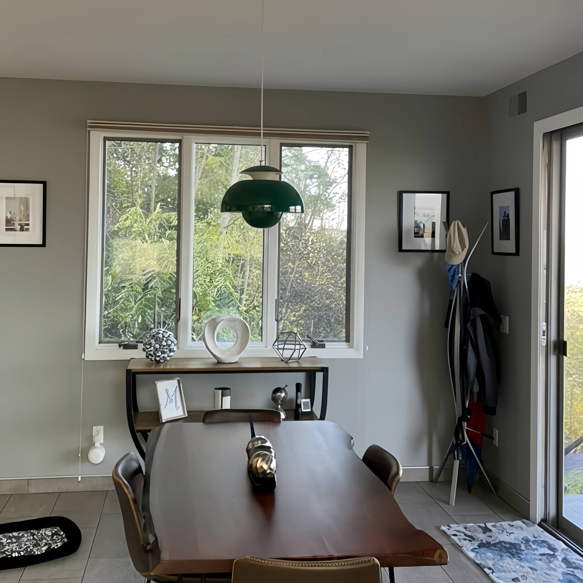 Kundenfoto der grünen Orin Pendelleuchte im Esszimmer