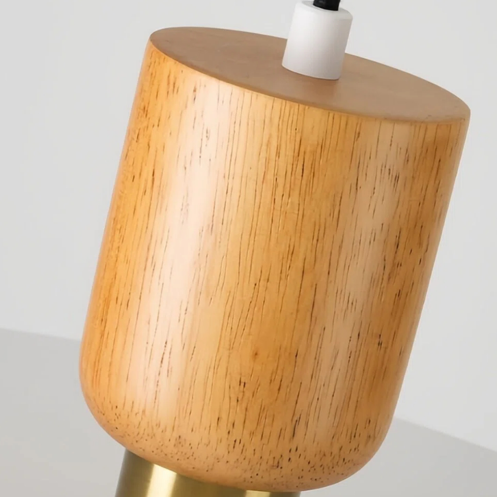 Close-up detail of the Orbulis pendant wood and shade finish