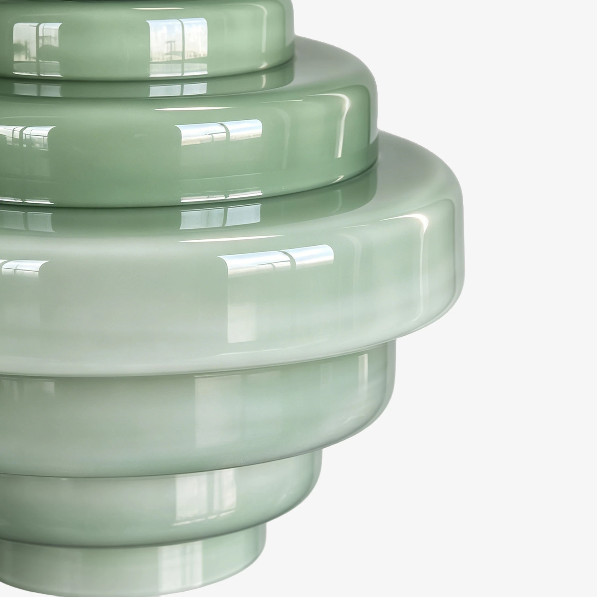 Close-up of glossy green gradient glass pendant shade
