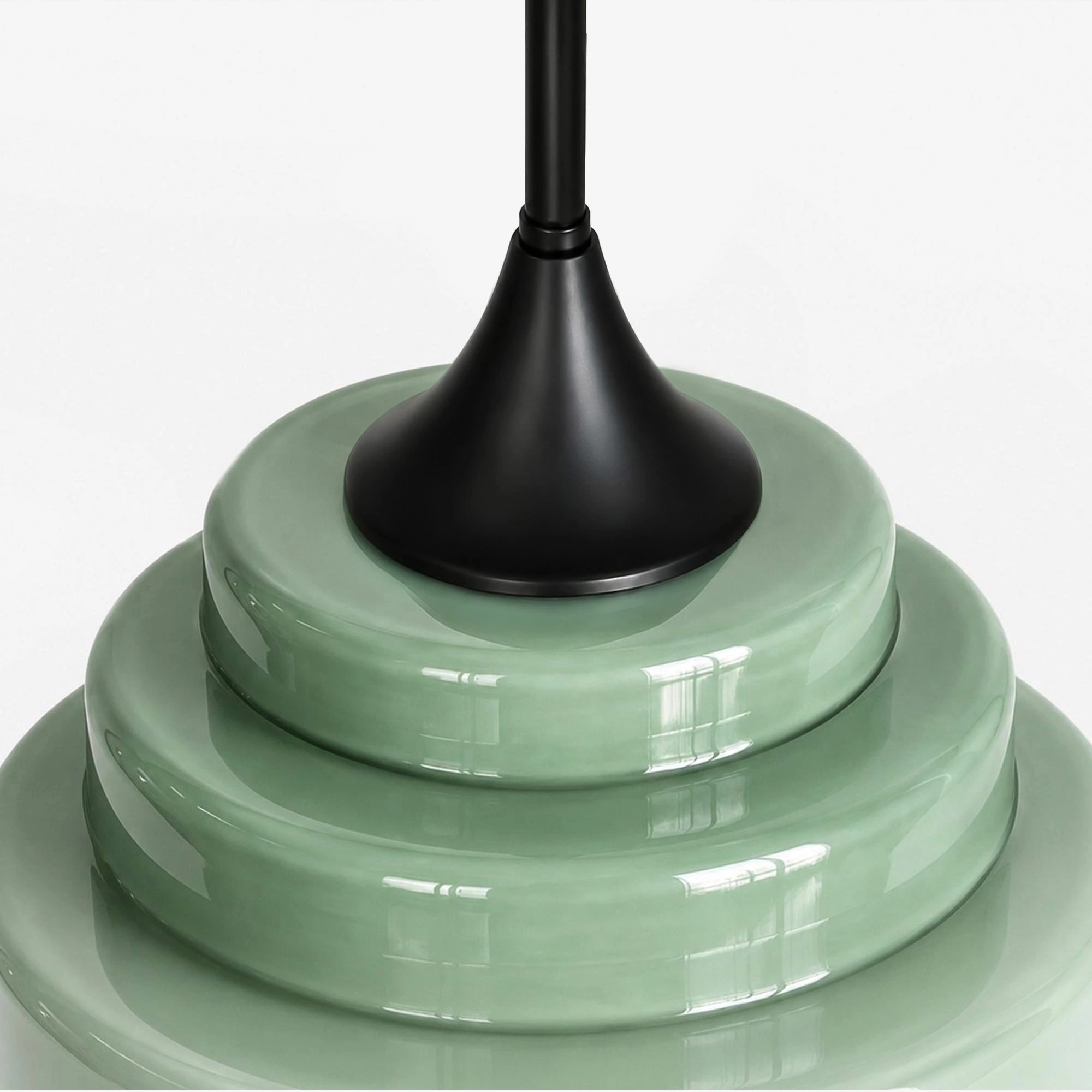 Black canopy and top detail of green Sanenos pendant light