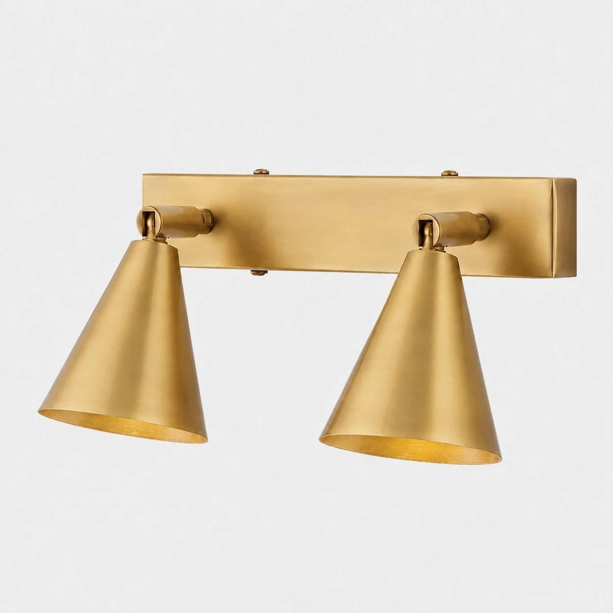 Two-head brass adjustable cone wall lamp on linear backplate
