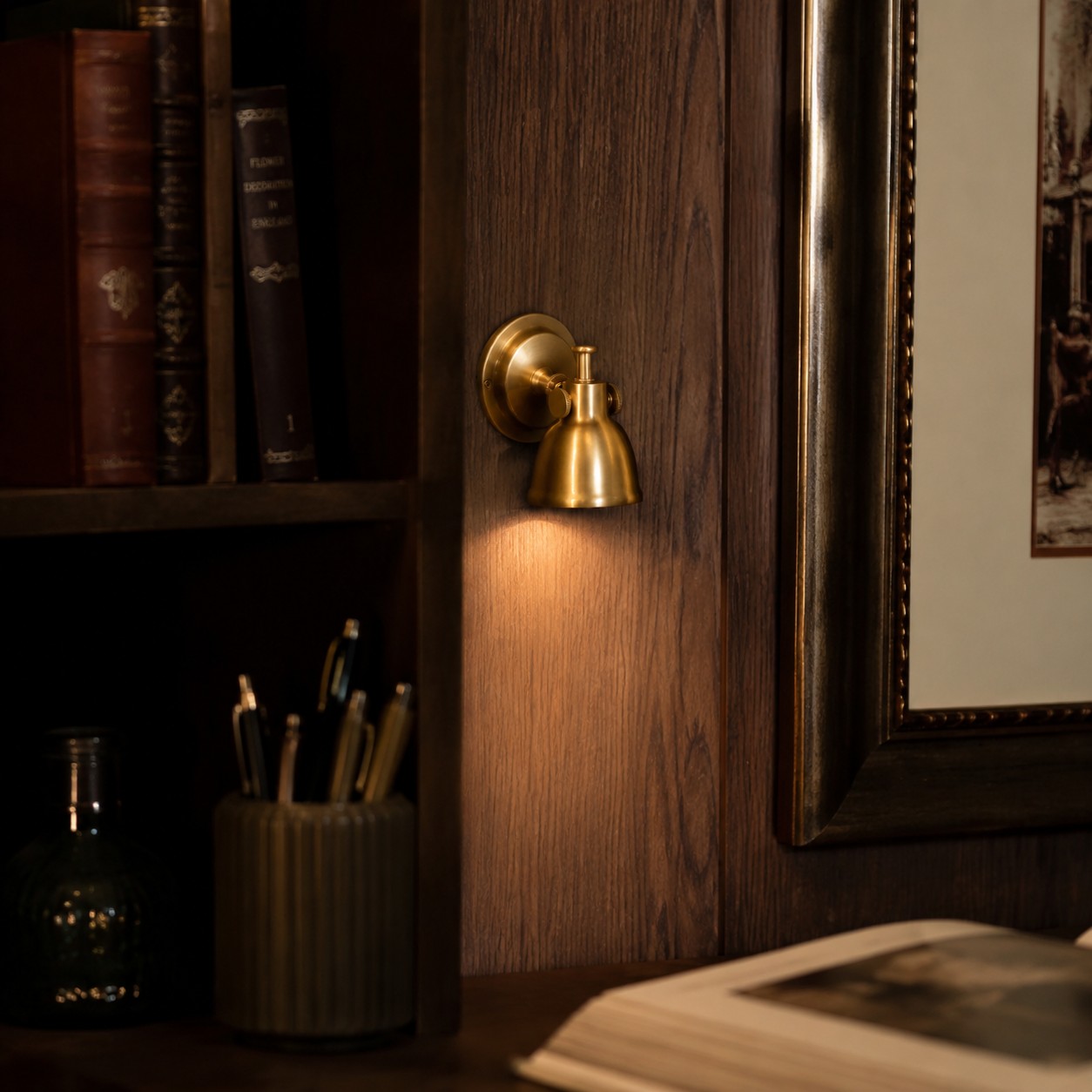 Brass wall lamp installed in a warm interior