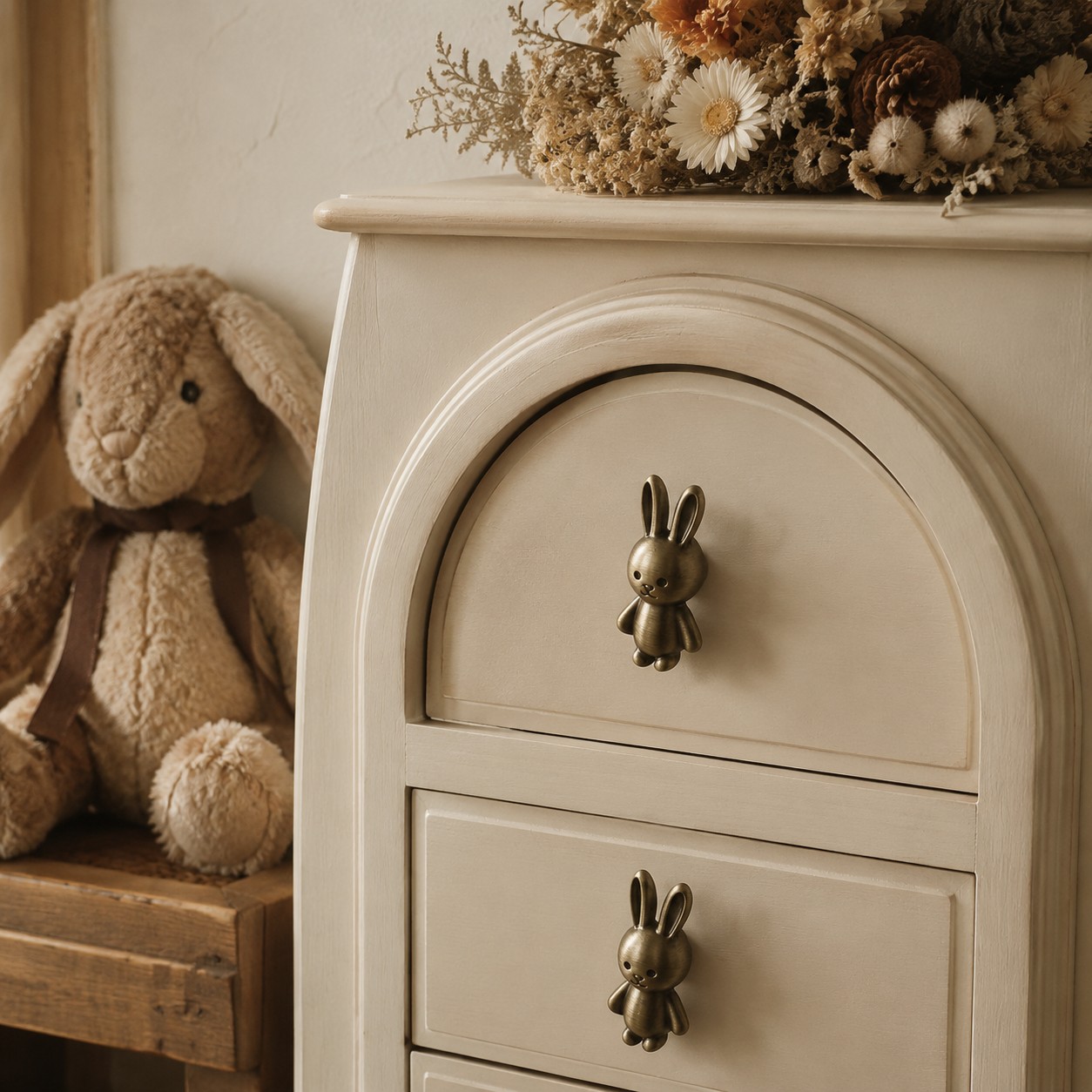 Rabbit cabinet knobs on nursery dresser drawers