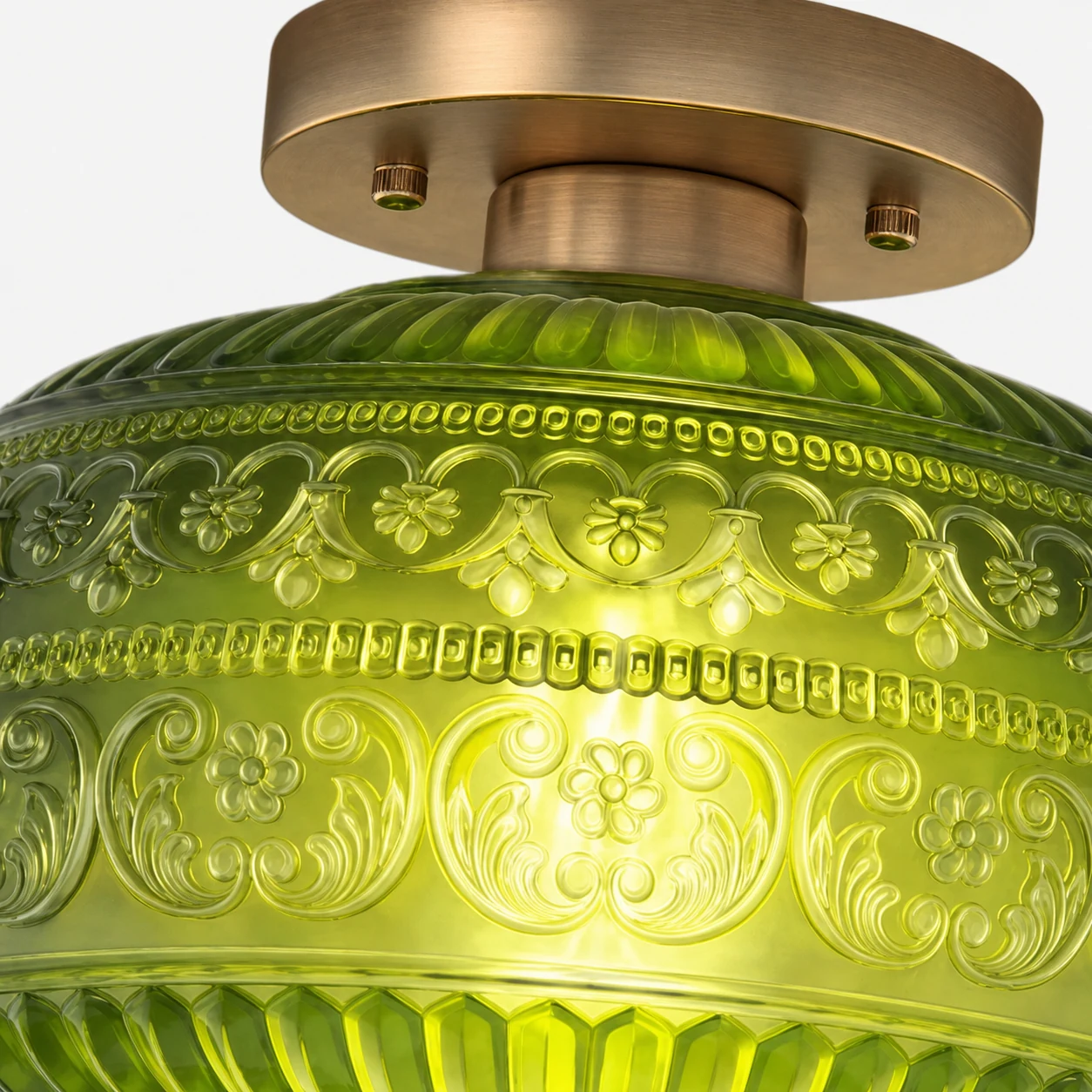 Close-up of Lurex patterned glass and gold metal detail