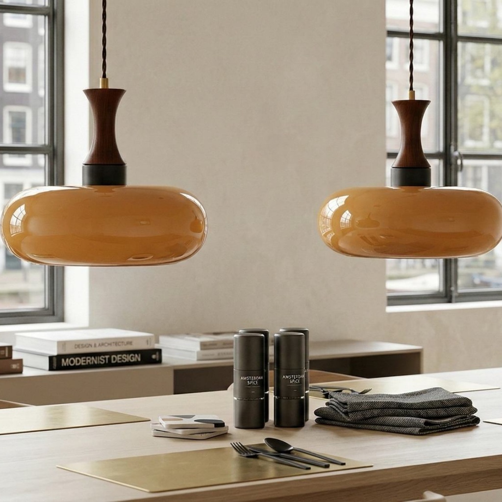Two Velora pendants installed above an interior worktable