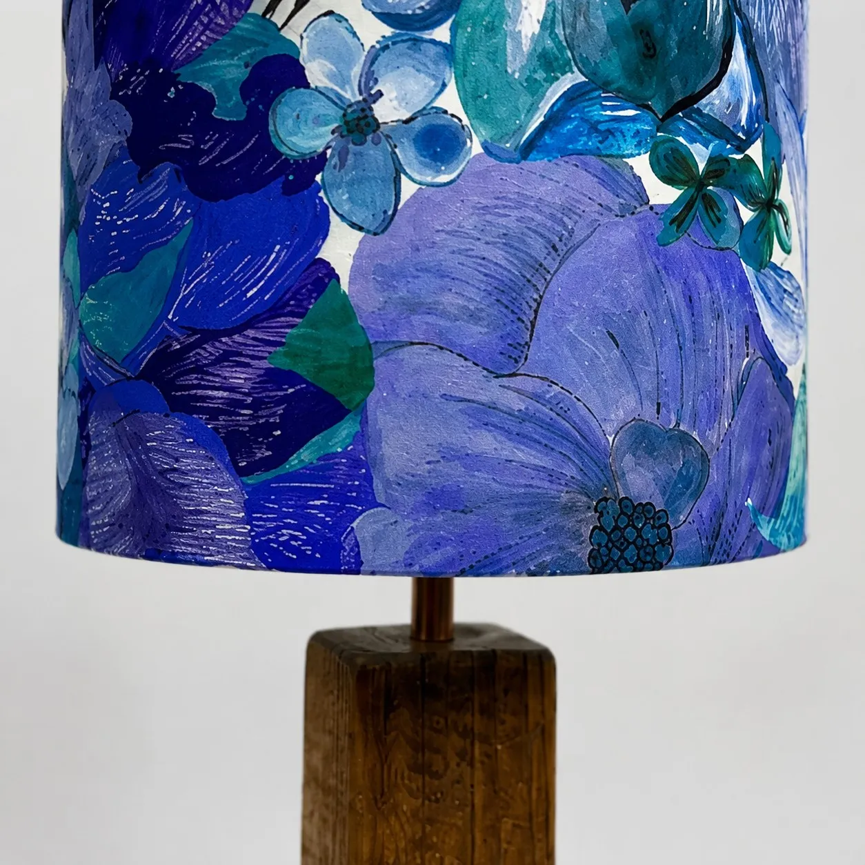 Colorful printed fabric table lamp in a styled interior
