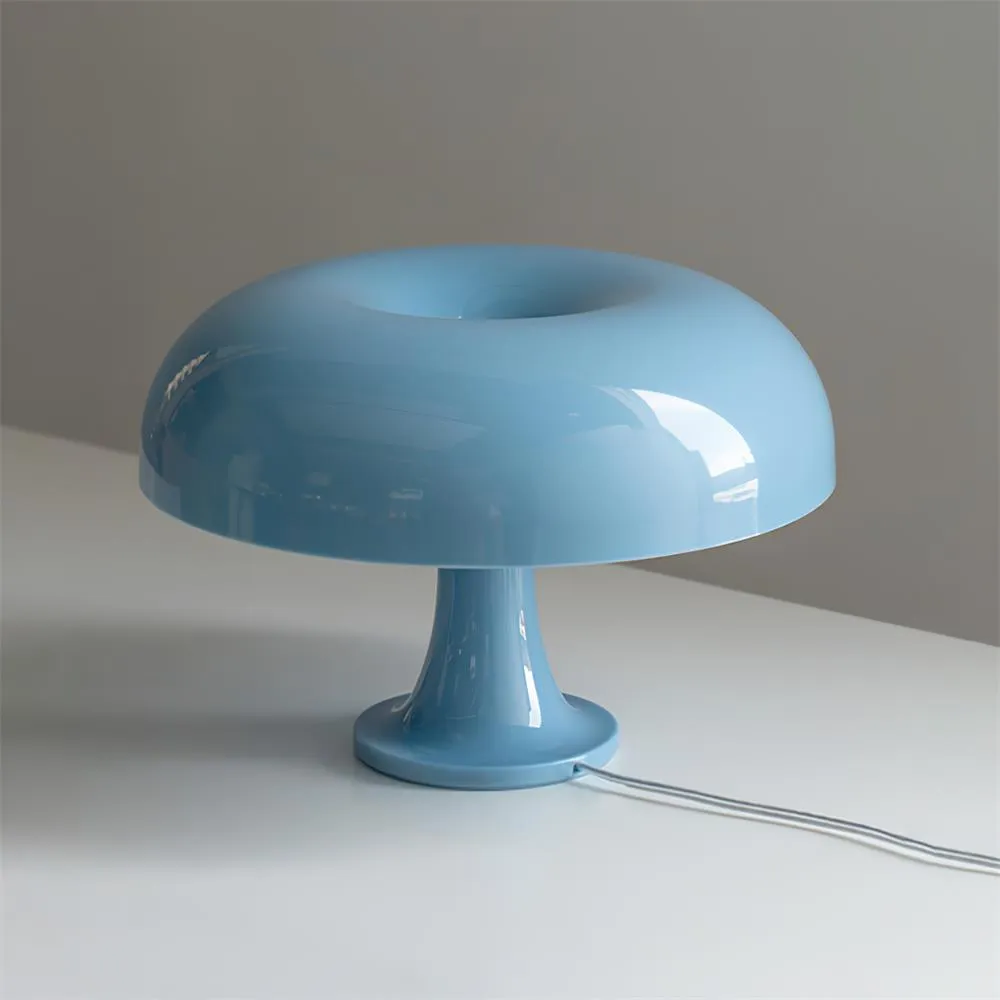Side view of the compact Nessino table lamp