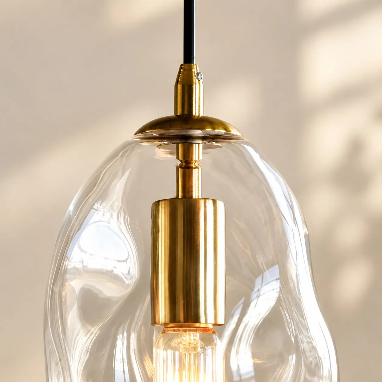 Brass-Finish Canopy | Hand-Blown Glass Globe Pendant — A layered perspective
